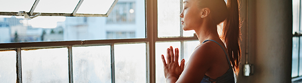 Person holding a yoga pose